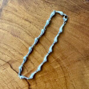 Rare Tiffany & Co. Elsa Peretti Continuous Teardrop Sterling Silver Bracelet